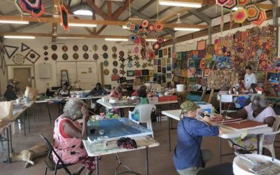 Female Wik and Kugu artists paint their stories
